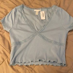 New Tillys blue baby tee